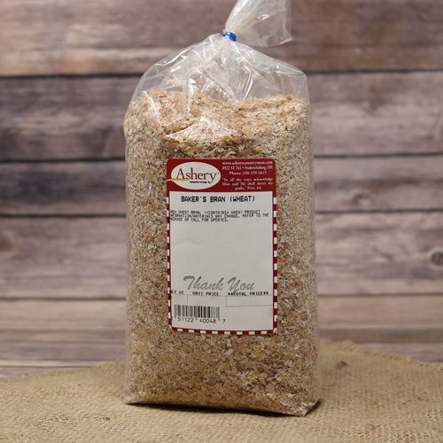 A bag of Baker's Wheat Bran, sealed with a twist tie, on rustic burlap with a wooden background.