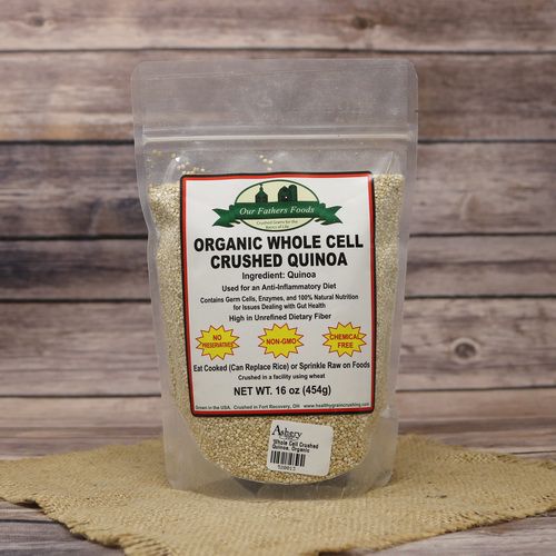 Bag of Organic Whole Cell Crushed Quinoa on rustic burlap and wooden background.