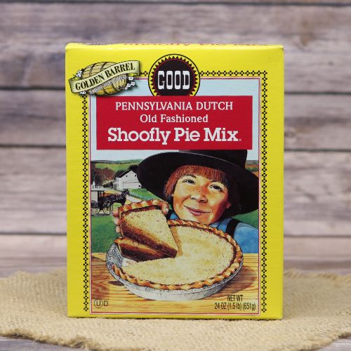 Yellow pie mix box with a picture of a pie in front of a little Dutch boy.